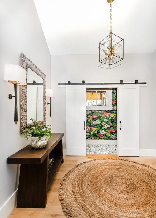 Bright, contemporary interior in a 1917 Wash Park bungalow, designed by Denver Design Group, with vaulted ceilings and open living space and remodel of the foyer