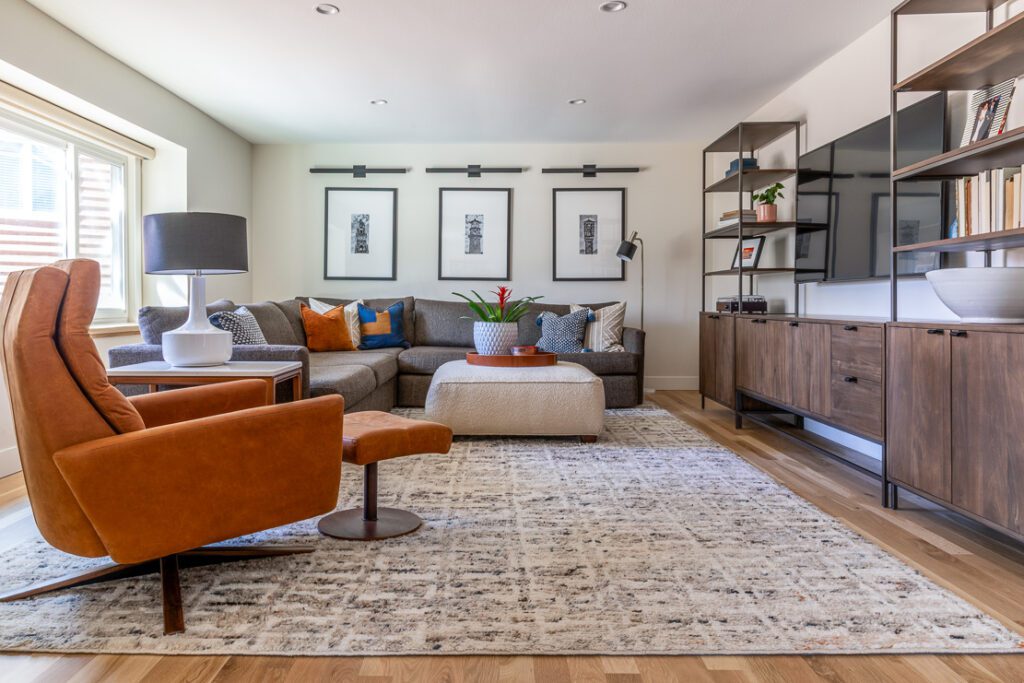 Classic contemporary main floor living room remodel in Littleton designed by Denver Design Group with custom finishes and timeless style