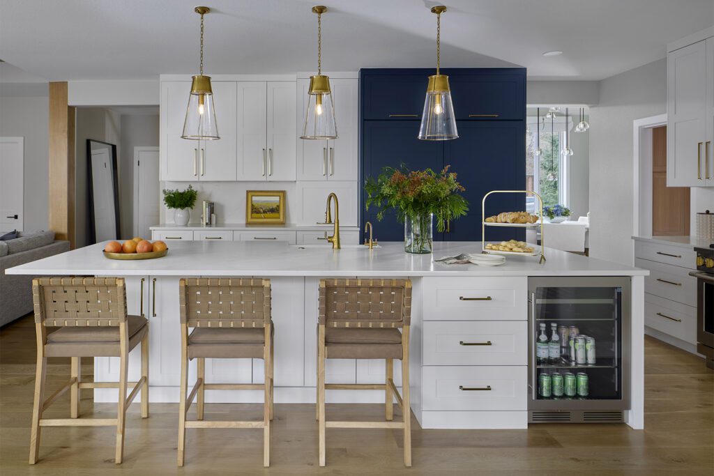 Littleton home remodel with open concept design and reimagined main level layout with kitchen island