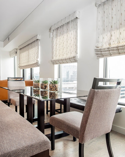 Custom window treatments by Denver Design Group