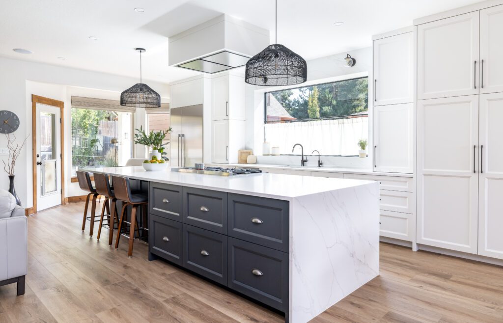 stle Rock open floor plan kitchen with expansive island, storage, and seating