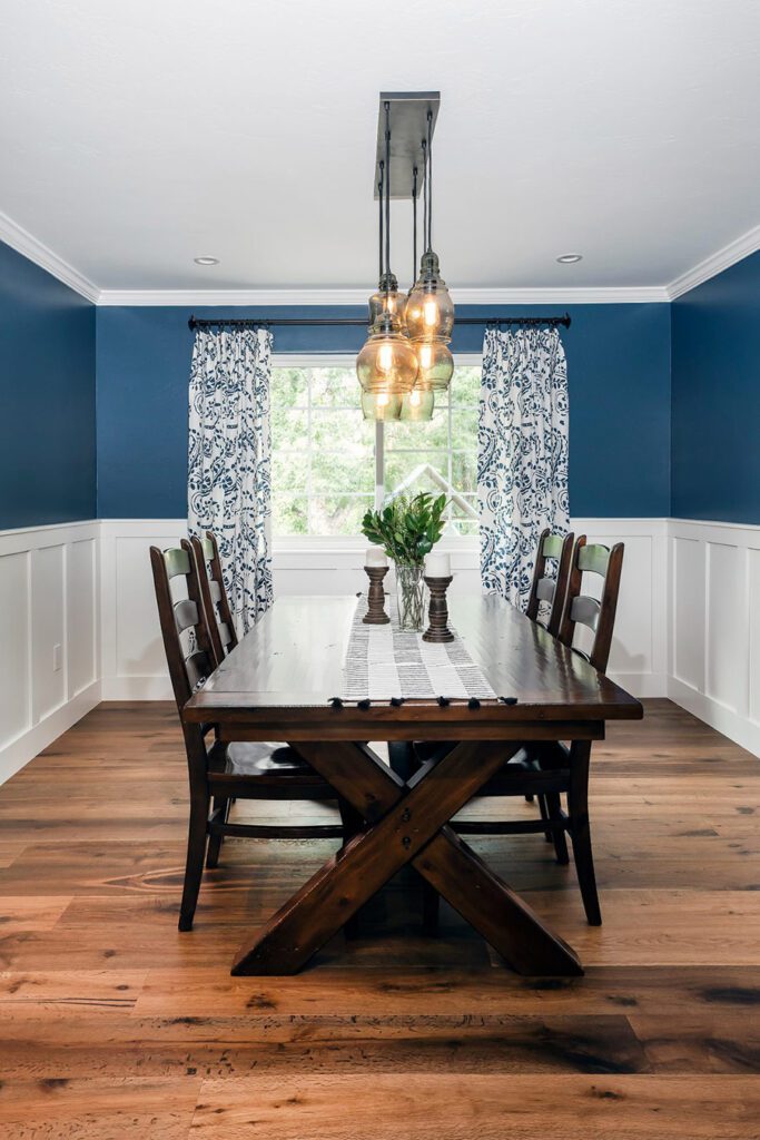 Modern farmhouse remodel in Centennial Colorado by Denver Design Group with custom lighting, accented walls, and window treatments