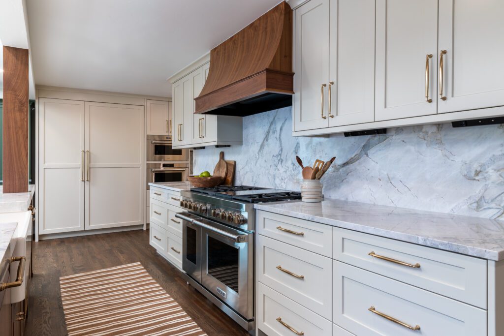 Open concept kitchen with walk-in pantry, luxury appliances, and Matarazzo quartzite