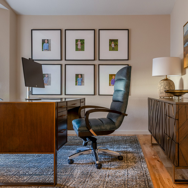 Custom home office with built-in desk and gallery wall second home remodel by denver design group in Lone Tree Colorado