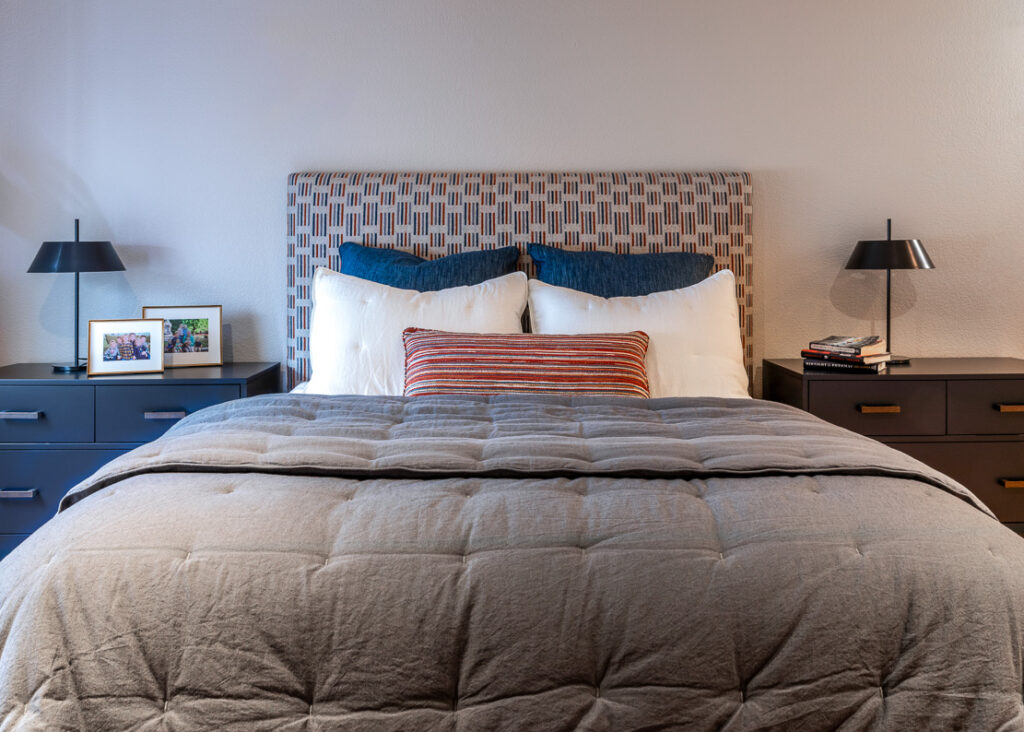 Guest bedroom with bold patterned Massoud headboard Lone Tree Colorado