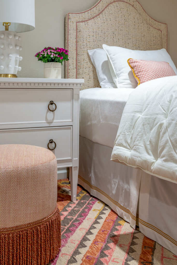 Guest bedroom with arched Massoud headboard and patterned runner Lone Tree Colorado