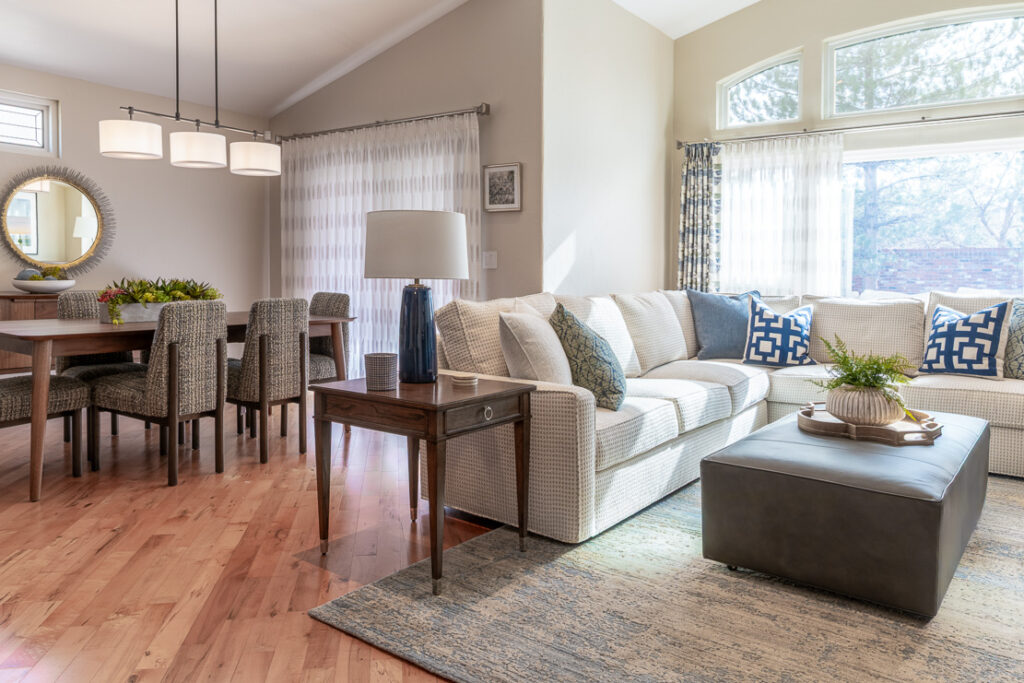 Open plan living and dining room with custom Century and Vanguard furnishings Lone Tree Colorado Denver Design Group