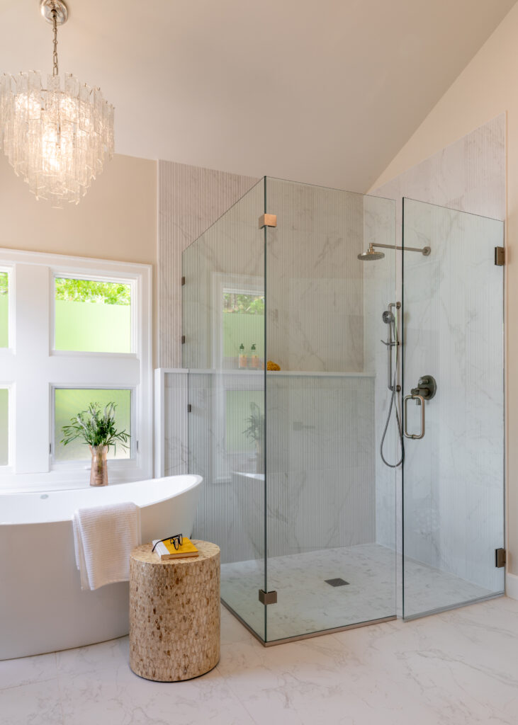 Primary bathroom remodel with frameless glass shower and updated finishes Greenwood Village Colorado