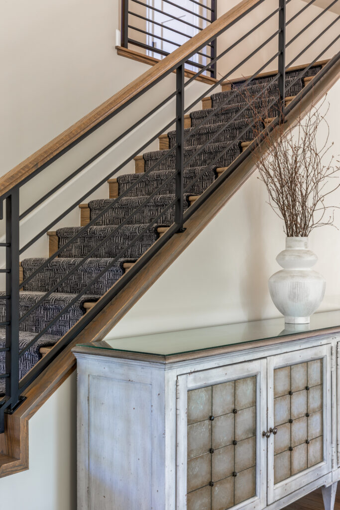 Updated staircase with custom iron horizontal railing traditional modern remodel Greenwood Village Colorado